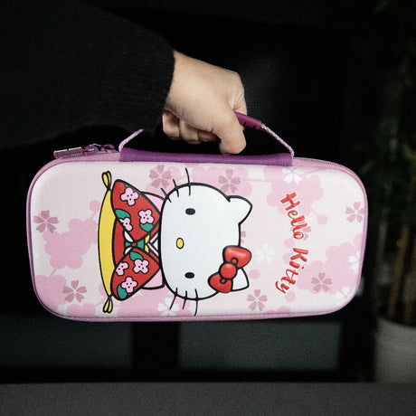 Housse de protection et transport - KONIX - Hello Kitty Nintendo Switch 2 - Rangement accessoires - Motif 3D - Rose