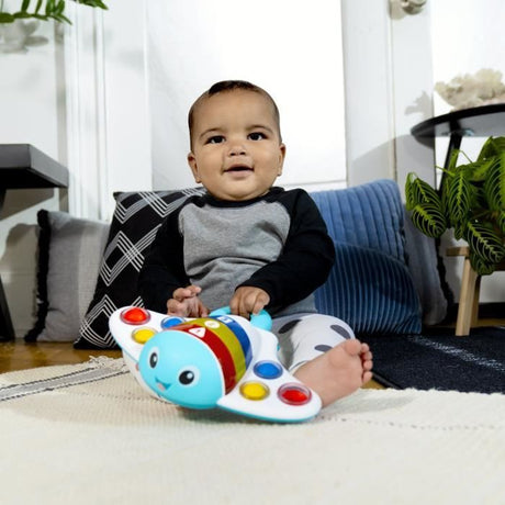 BABY EINSTEIN  RAIE - Jouet intéractif d'éveil sensoriel, musical, apprentissage des couleurs, cadeau bébé  6M+