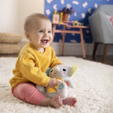 BRIGHT STARTS Jouet bébé, peluche doudou, veilleuse, éléphant Hug-a-Bye Baby, sons et lumieres, cadeau bébé