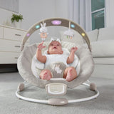 INGENUITY Transat bébé confort Petit Lapin, Arche d'éveil lumineuse, Coussin réducteur amovible, cadeau bébé