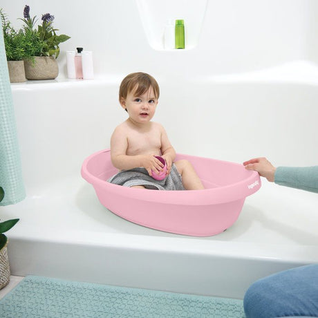 INGENUITY Baignoire bébé évolutive rose, extra-large, transat bébé hamac en tissu, support bébé assis, 2 jeux d'eau de 0 a 24 mois