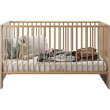 Chambre bébé duo PIA - Lit 70x140 cm + Commode a langer 2 portes - Décor chene sonoma et blanc mat - TRENDTEAM