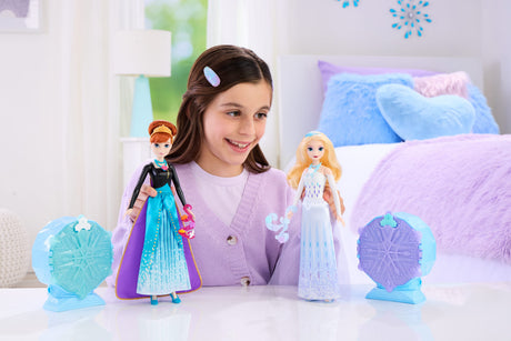 Poupée Jewel Reveal Anna, La Reine des Neiges, accessoires avec 8 surprises, 1 boîte a bijoux en forme de flocon de neige, 1 bague p