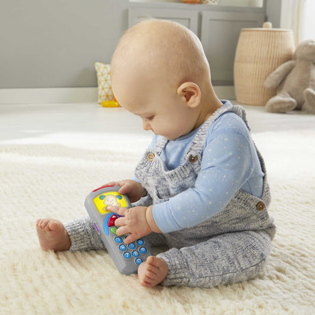Fisher-Price-La Télécommande de Puppy-Jouet d'éveil musical pour bébés HXB87